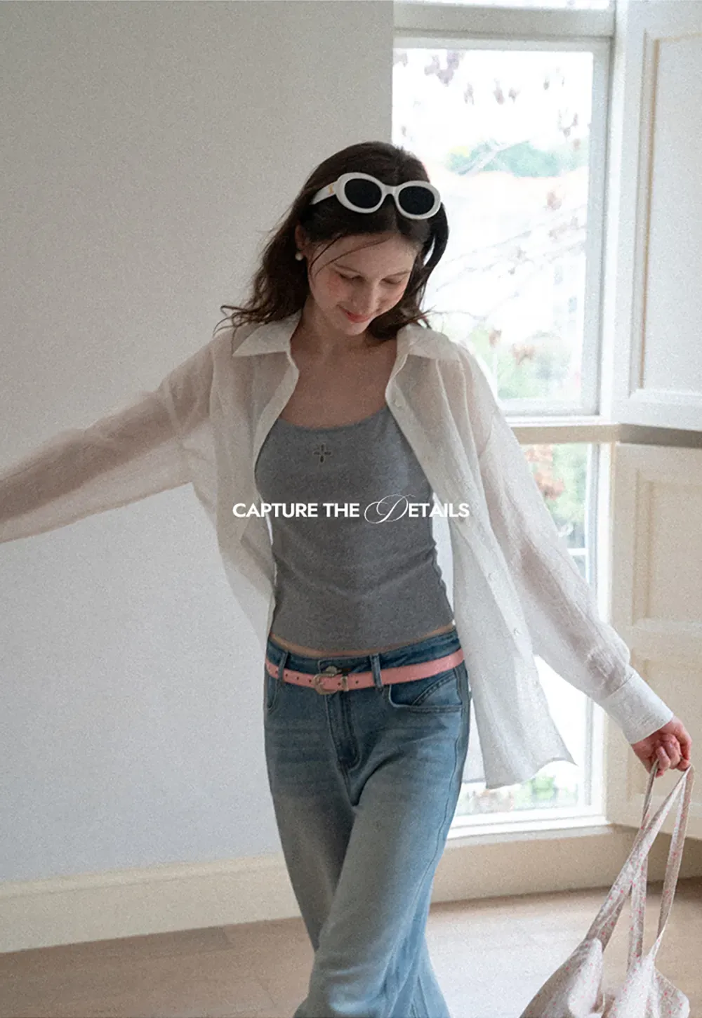 Gray tank top with small embroidered cross detail