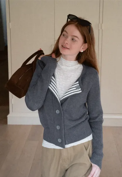 Elegant textured long sleeve top with subtle pattern design