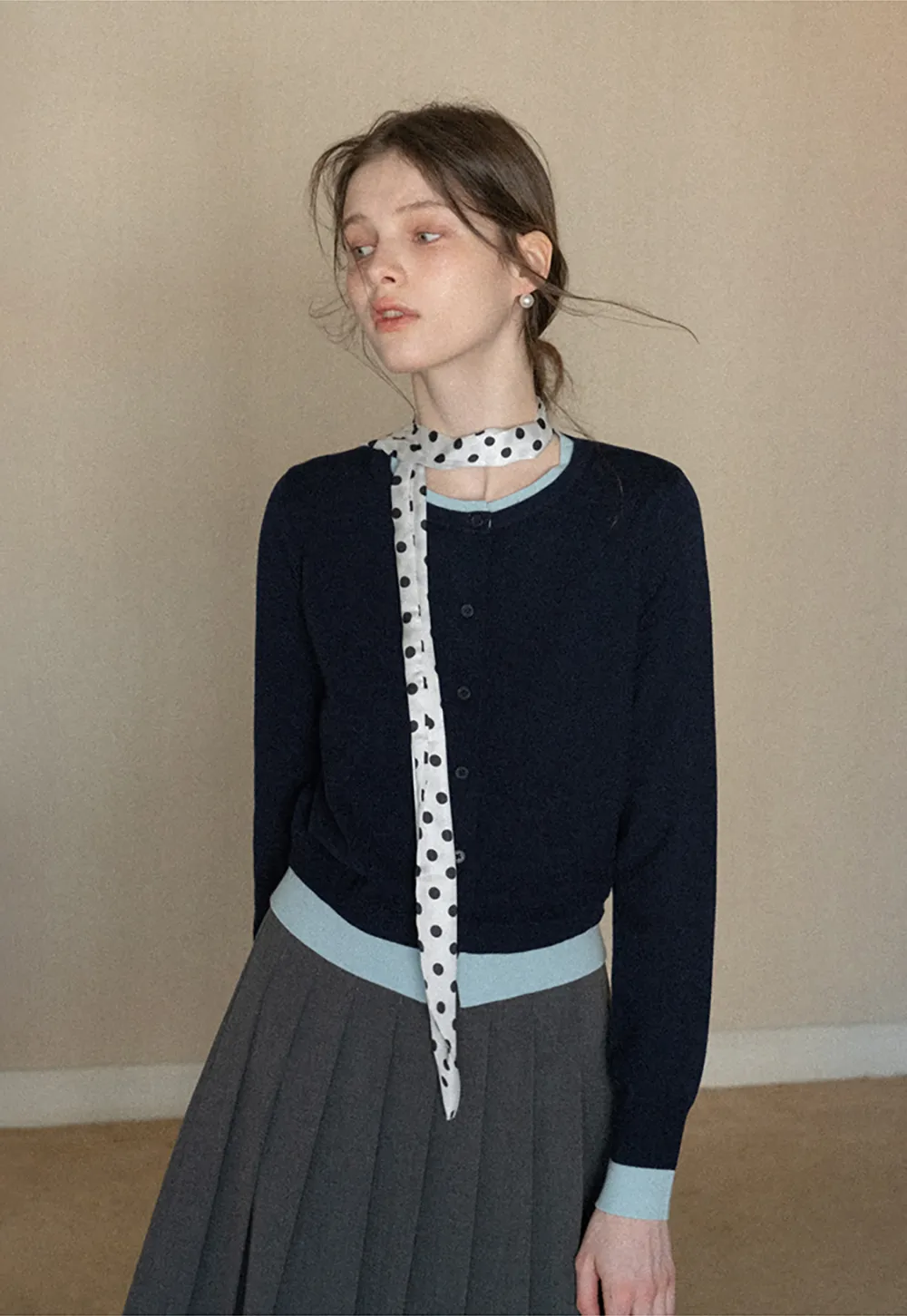 Elegant Round Neck Knit Sweater with Button Detail