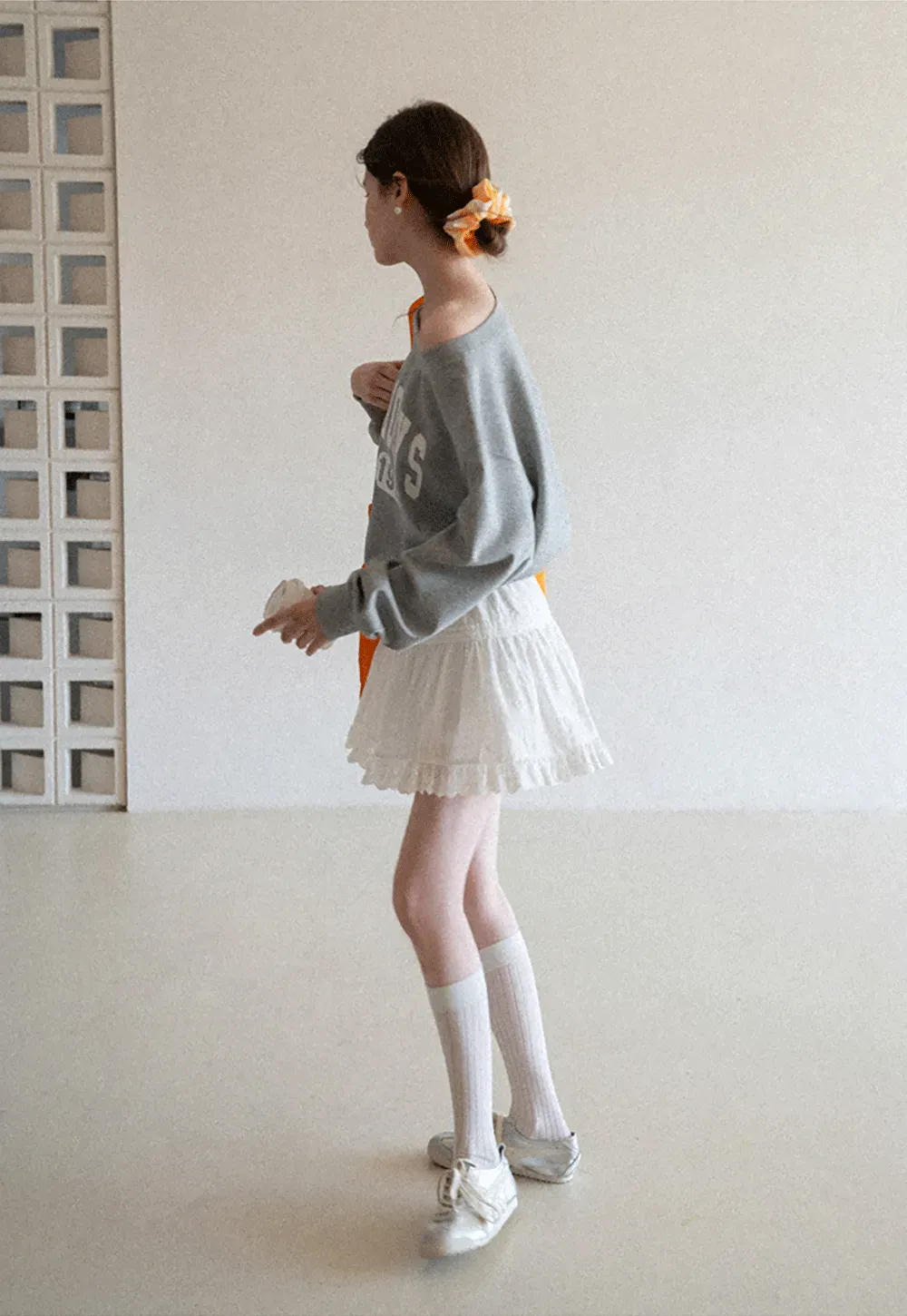 Gray Off Shoulder Sweatshirt with Bold Lettering and Year Print