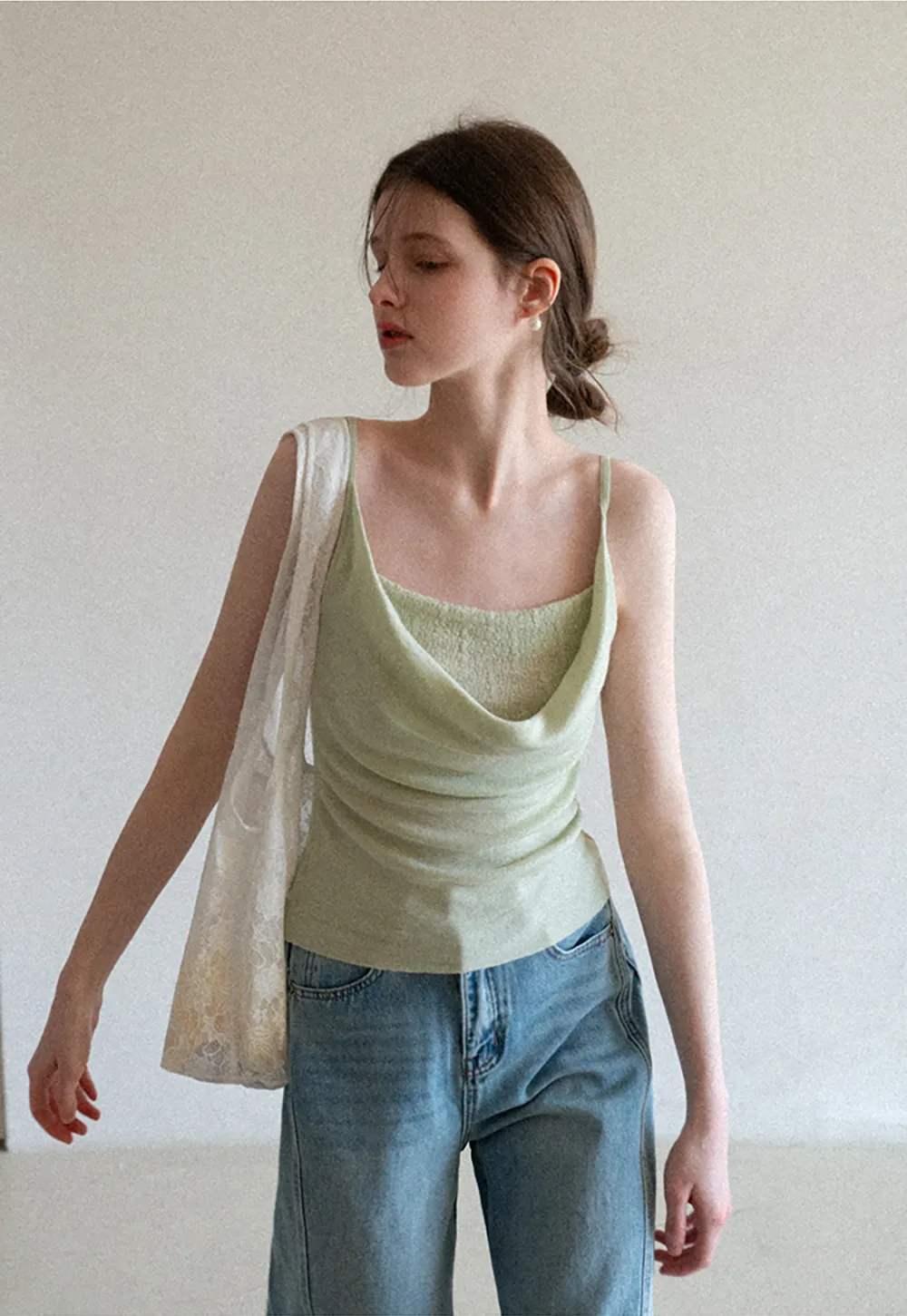Silk-like tank top with thin straps and draped neckline