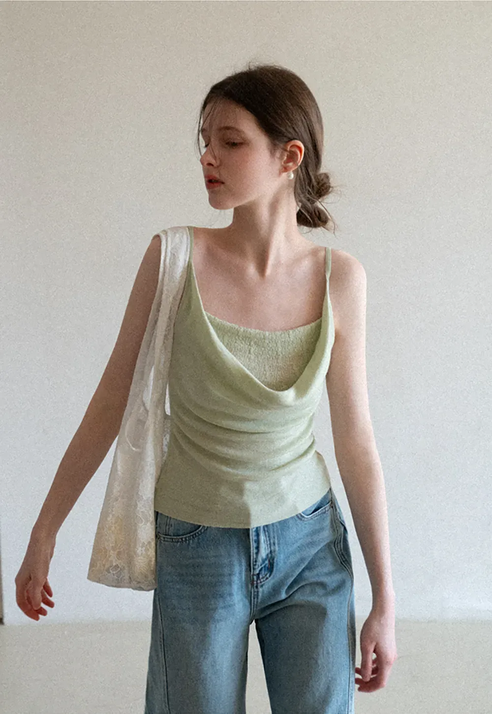Silk-like tank top with thin straps and draped neckline