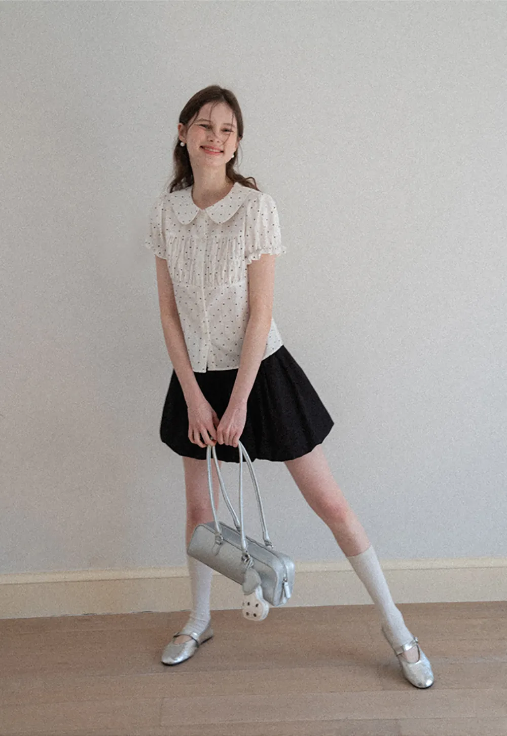 Polka dot shirt with ruffled sleeves and Peter Pan collar