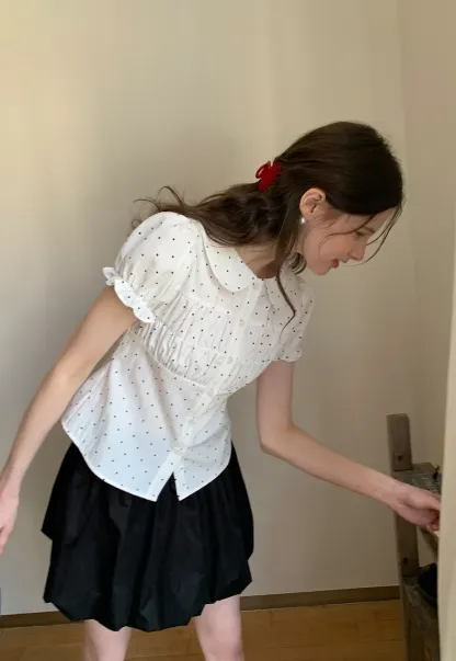 Polka dot shirt with ruffled sleeves and Peter Pan collar