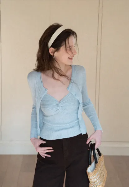 Ribbed knit sweater with V neckline and long sleeves