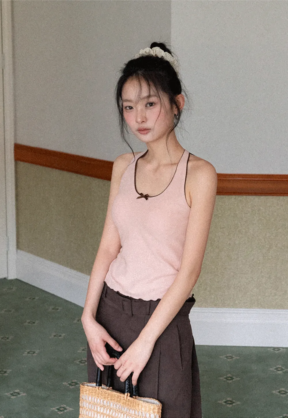 Halter neck tank top with thin straps and bow detail