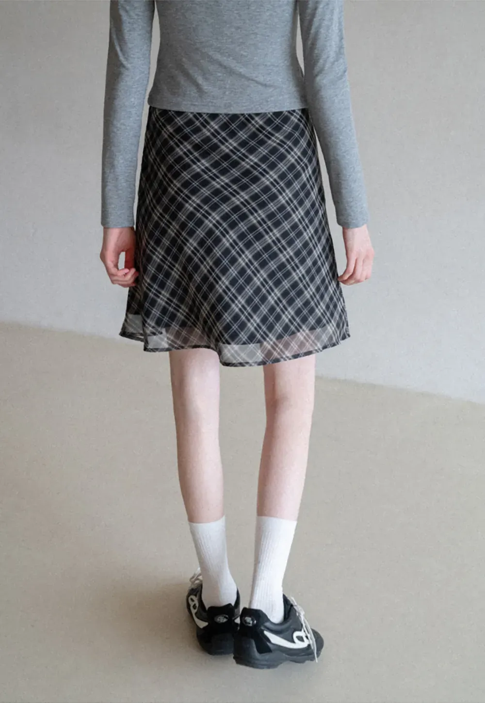 Plaid Skirt with Flowy Hem Design