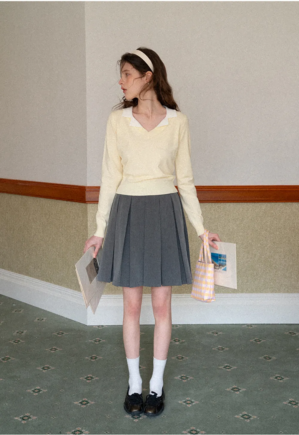 Pleated skirt with front bow detail