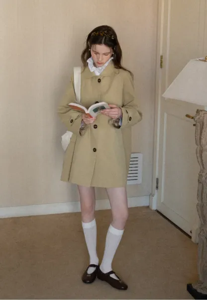 Elegant Trench Coat with Button Detailing and Pockets