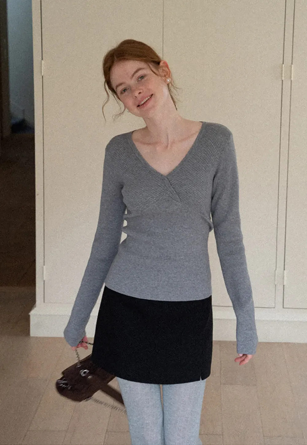 A-line mini skirt with textured fabric and central seam design