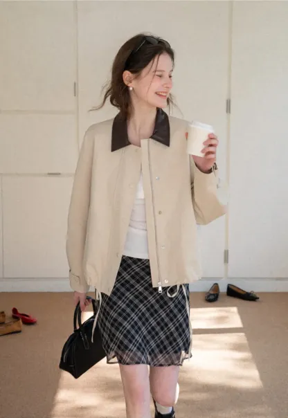 Short jacket with contrast collar and front buttons