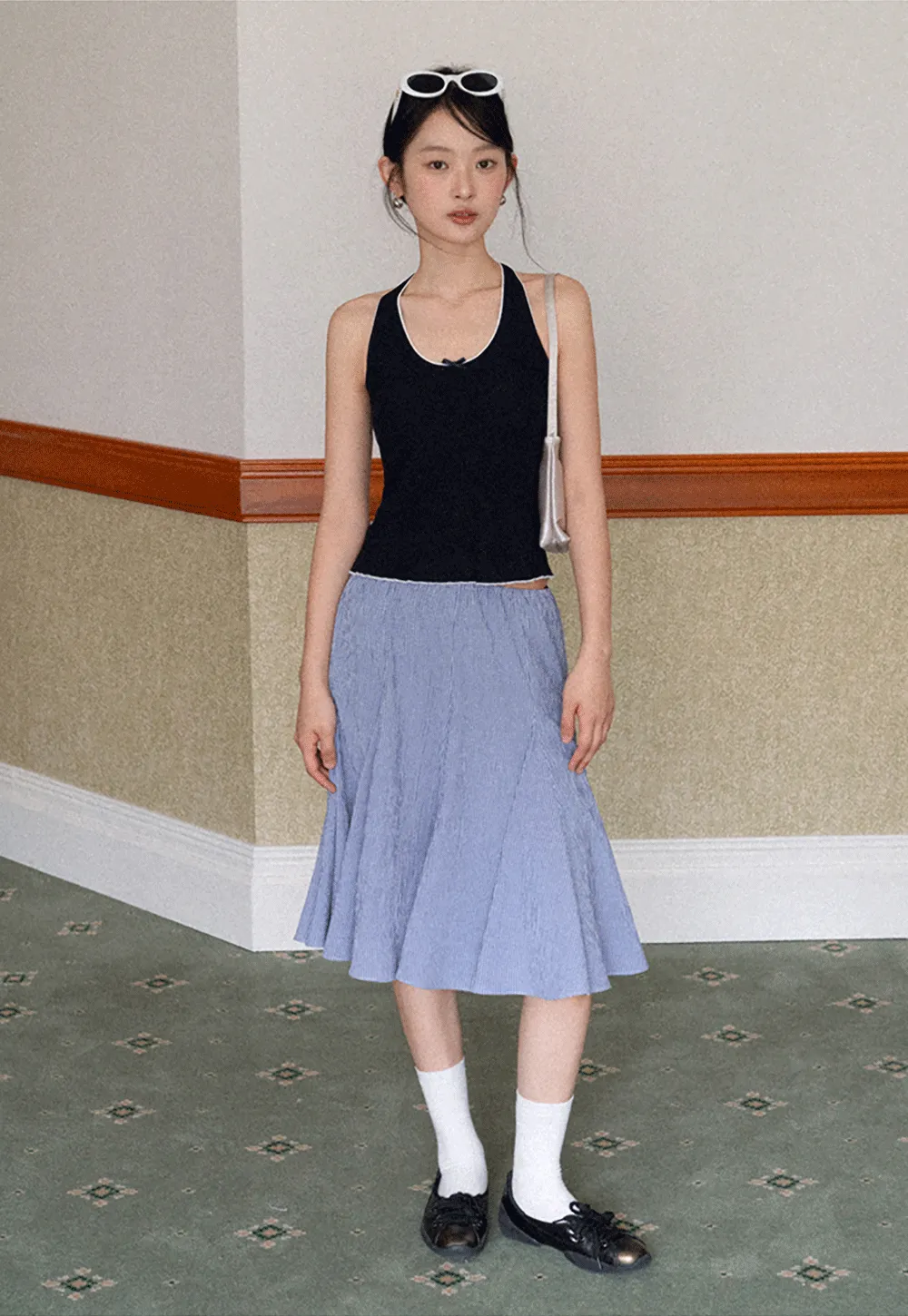 Halter neck tank top with thin straps and bow detail