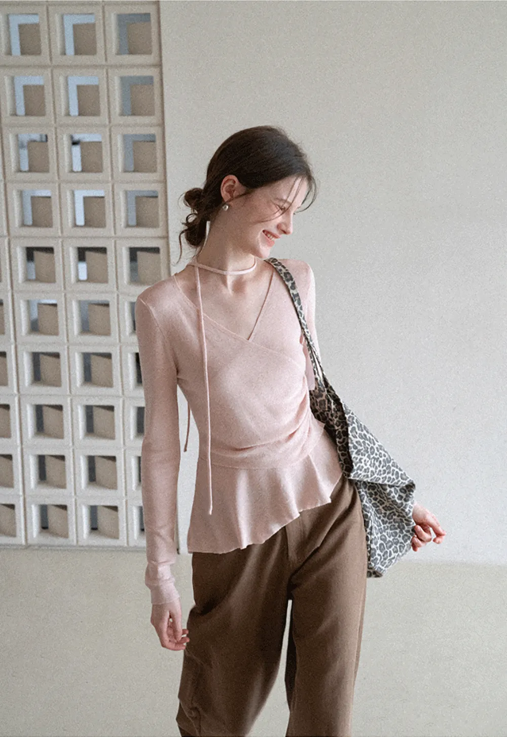 Long sleeve wrap knit sweater with ruched detail