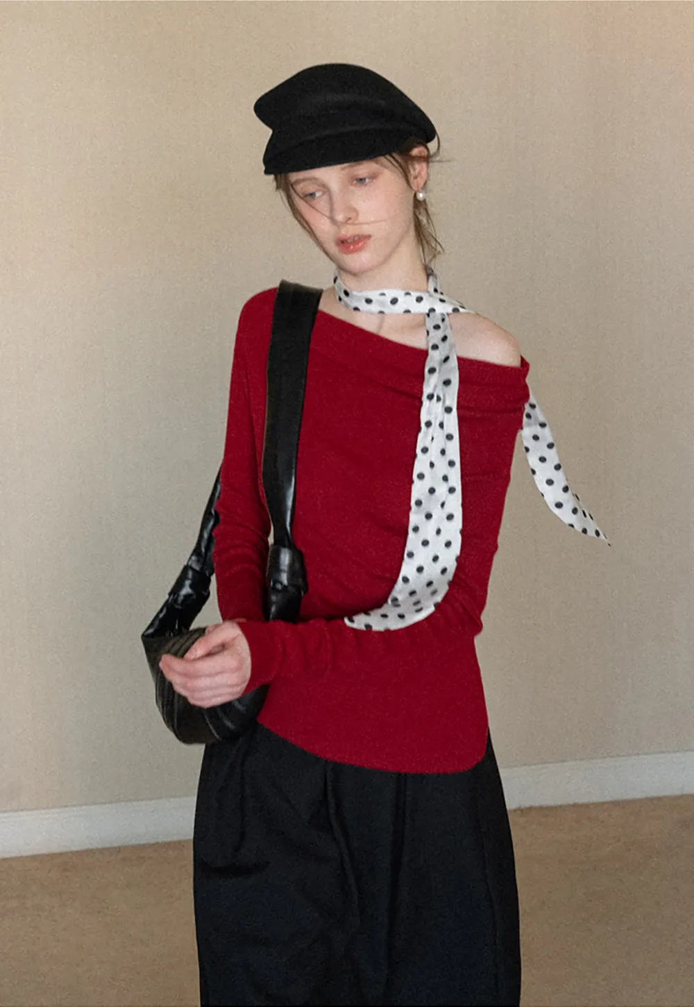 Elegant polka dot neck tie with bow design for women's fashion.