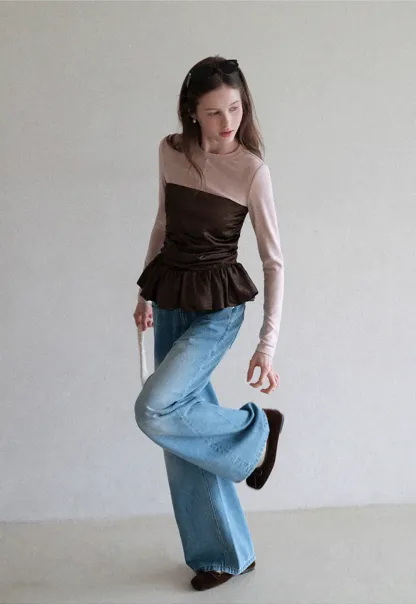 Long sleeve top with ruffled hem and layered design