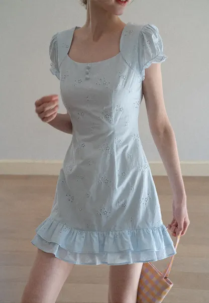 Eyelet dress with puff sleeves and ruffled hem