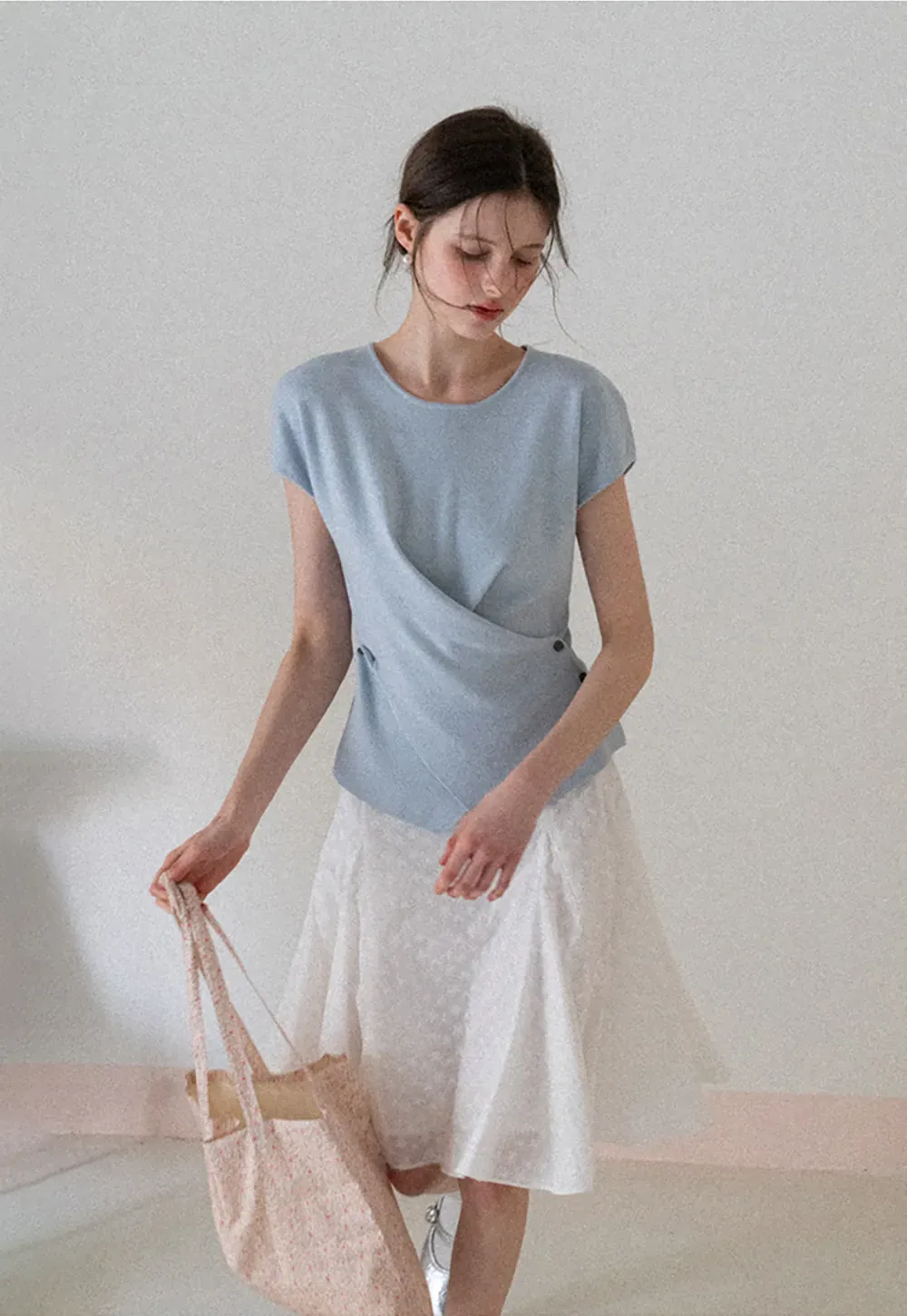 Flared pleated skirt with subtle texture