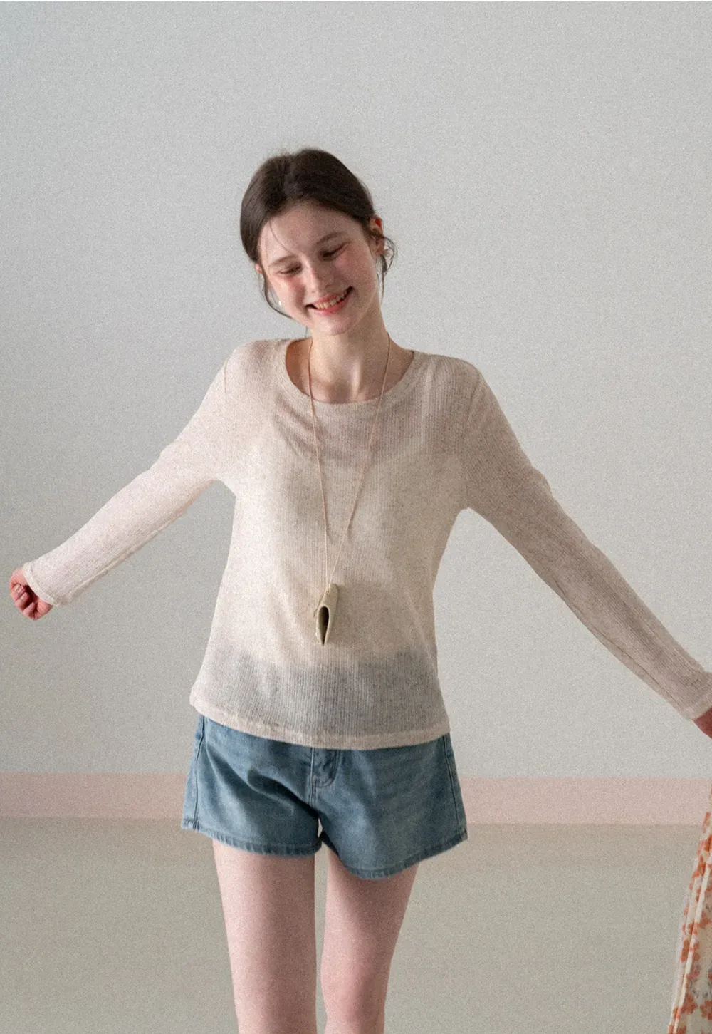 Long sleeve sheer knit top with round neckline