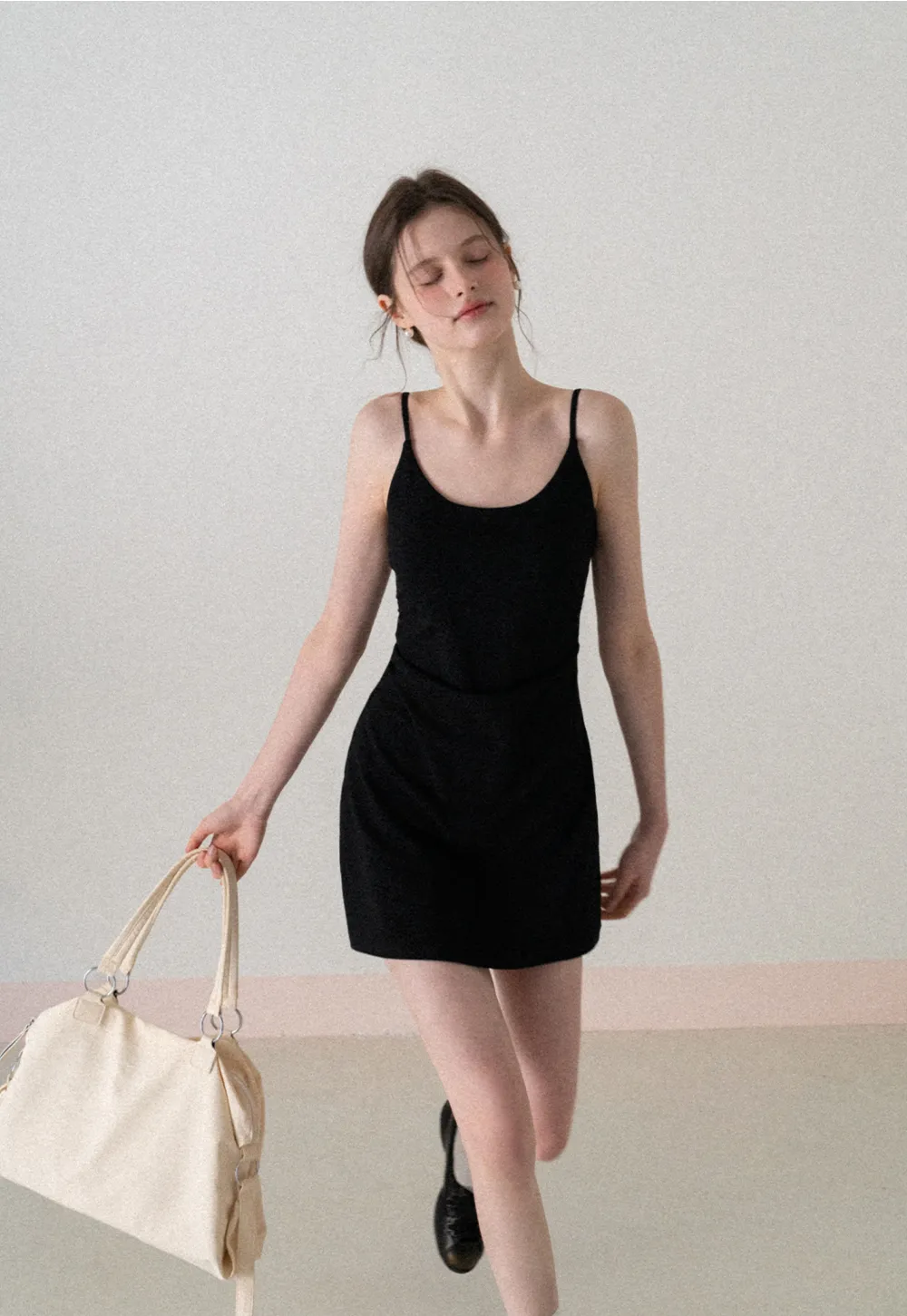 Sleeveless fitted mini dress with thin straps