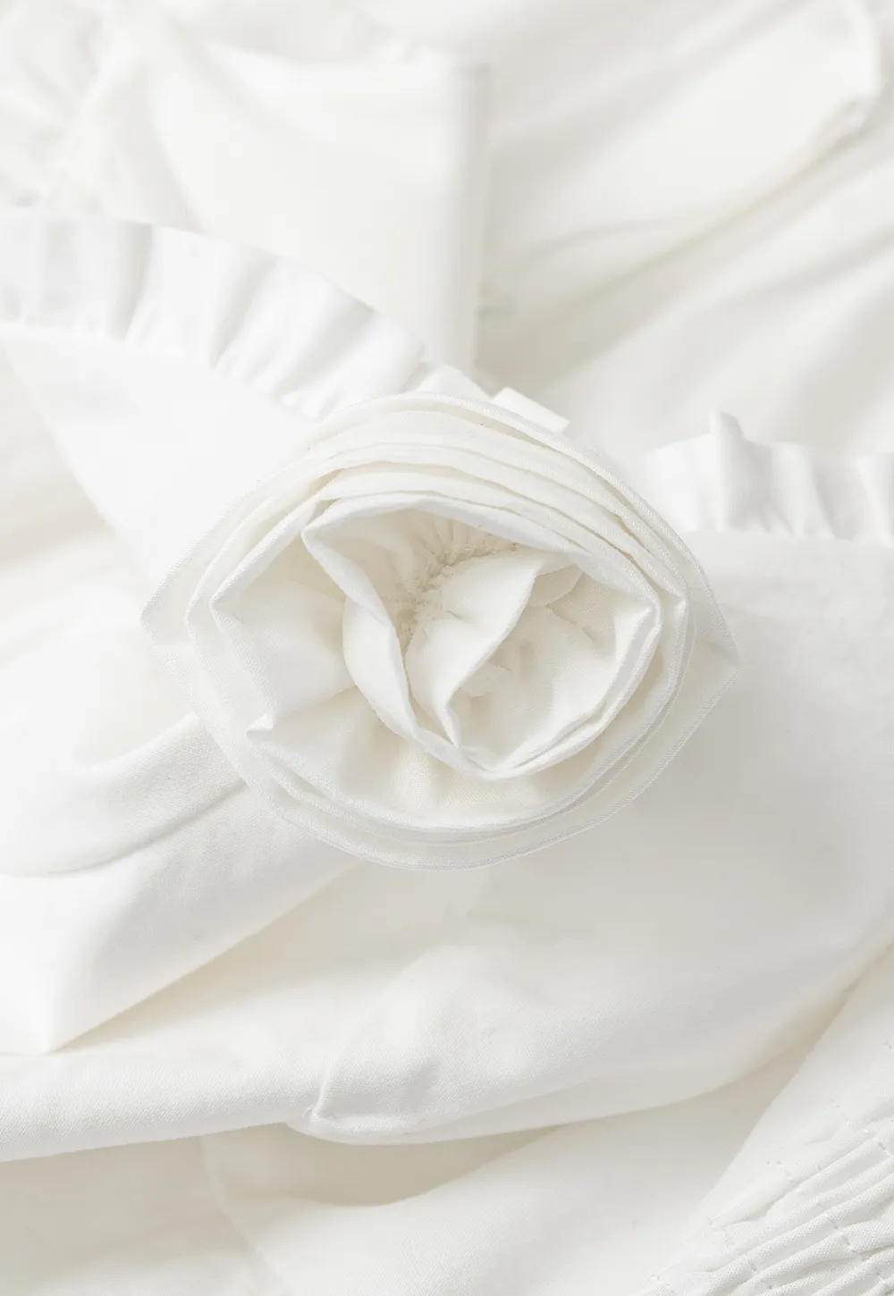 V neck sleeveless dress with floral embellishment