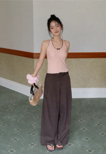 Halter neck tank top with thin straps and bow detail