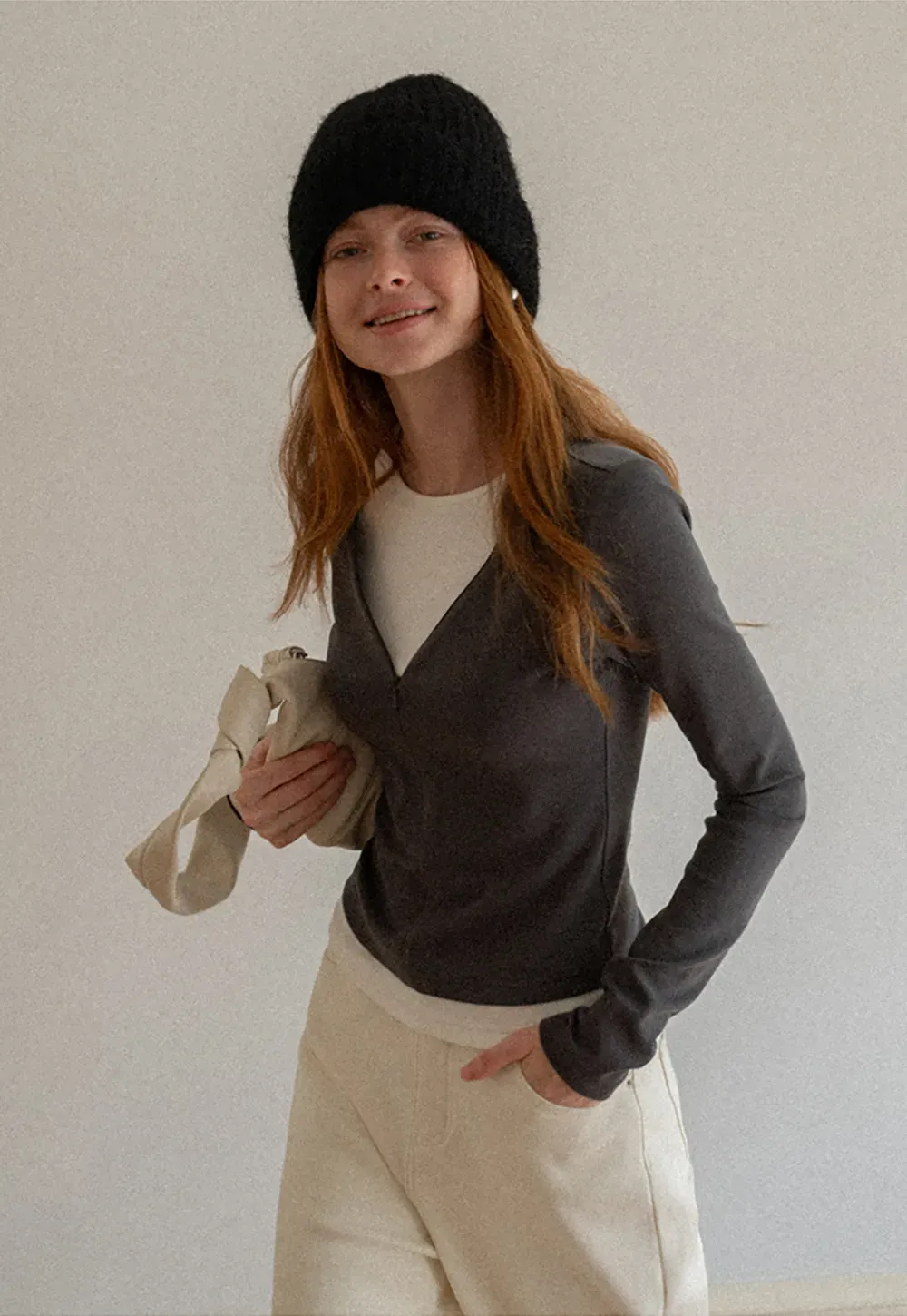 Long sleeve crop top with round neck and hem stitching design