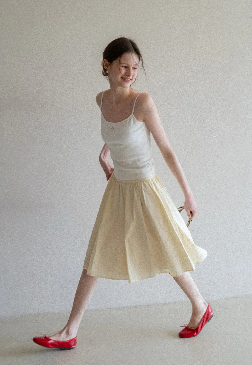 A-line pleated midi skirt with waistband
