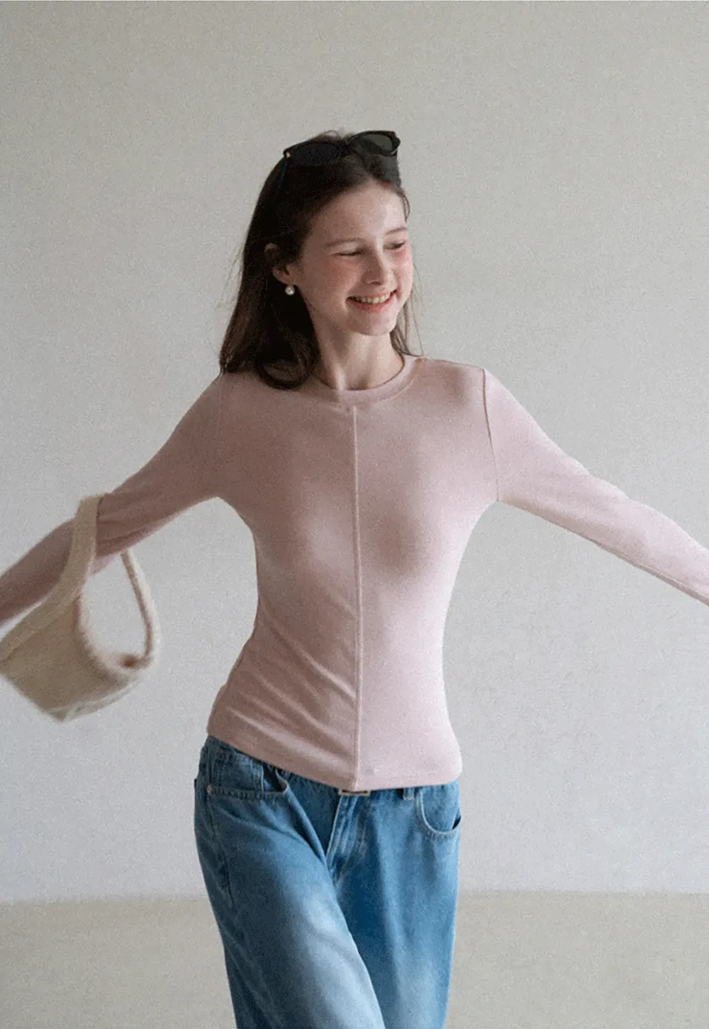 Long sleeve top with ruffled hem and layered design