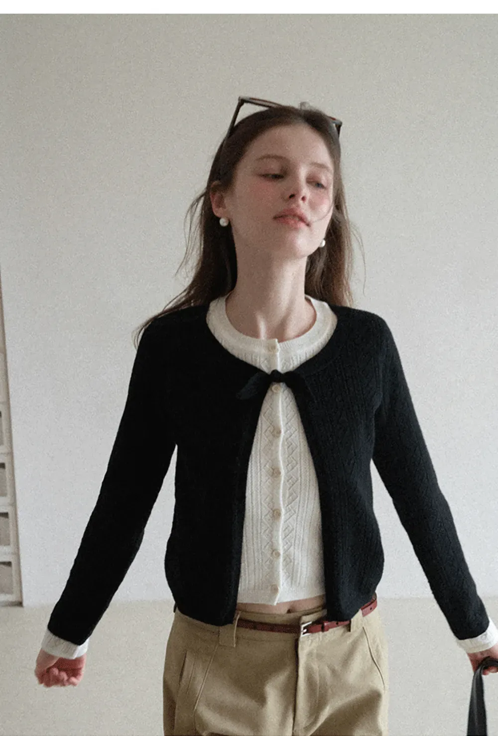 Elegant Knit Cardigan with Bow Detail and Ribbed Texture