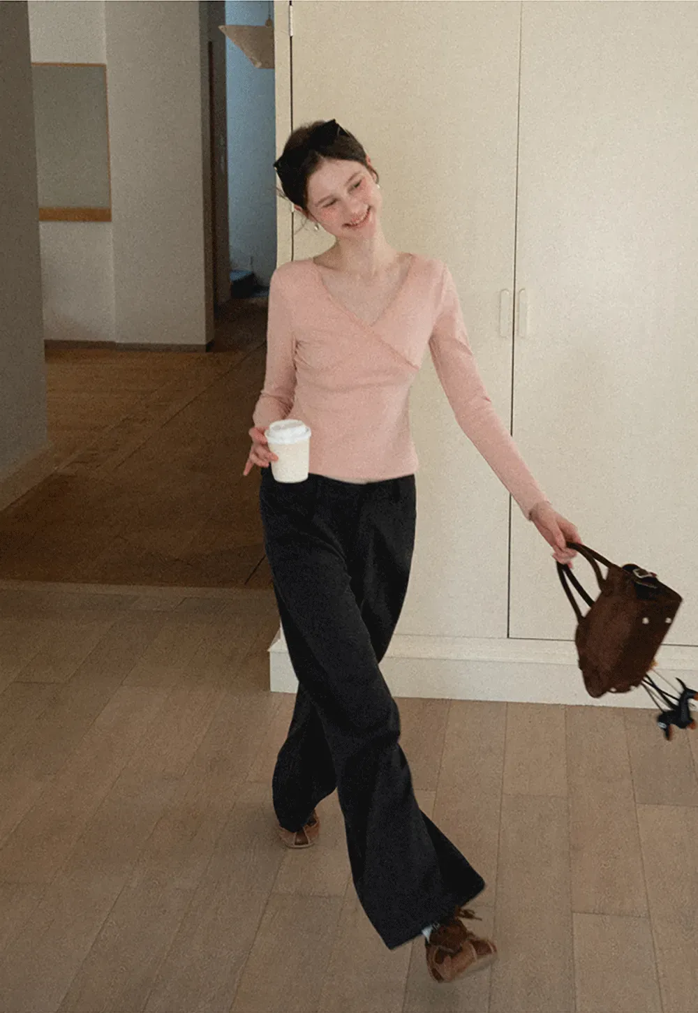 V neck long sleeve top with lace trim and fitted design