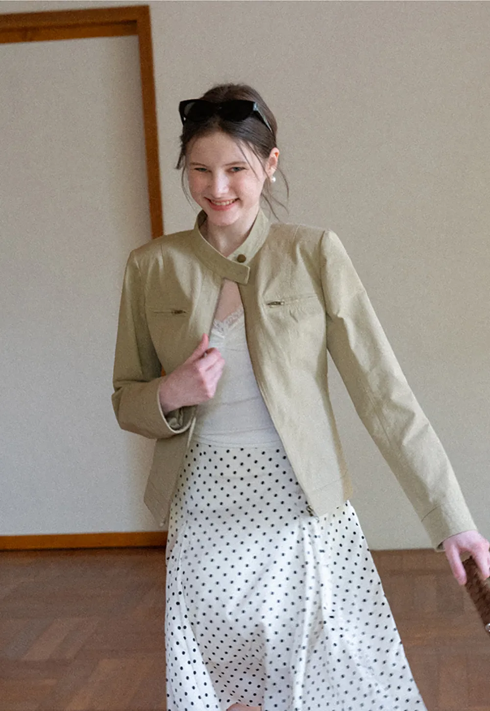 Short jacket with stand collar and front pockets