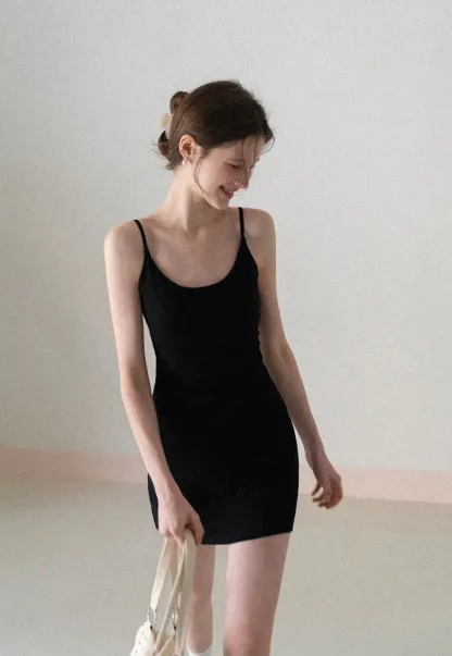 Sleeveless fitted mini dress with thin straps