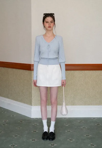 A-line mini skirt with front zipper and belt loops