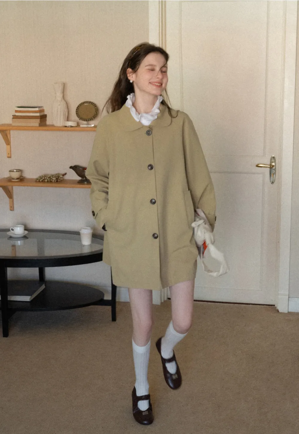 Elegant Trench Coat with Button Detailing and Pockets