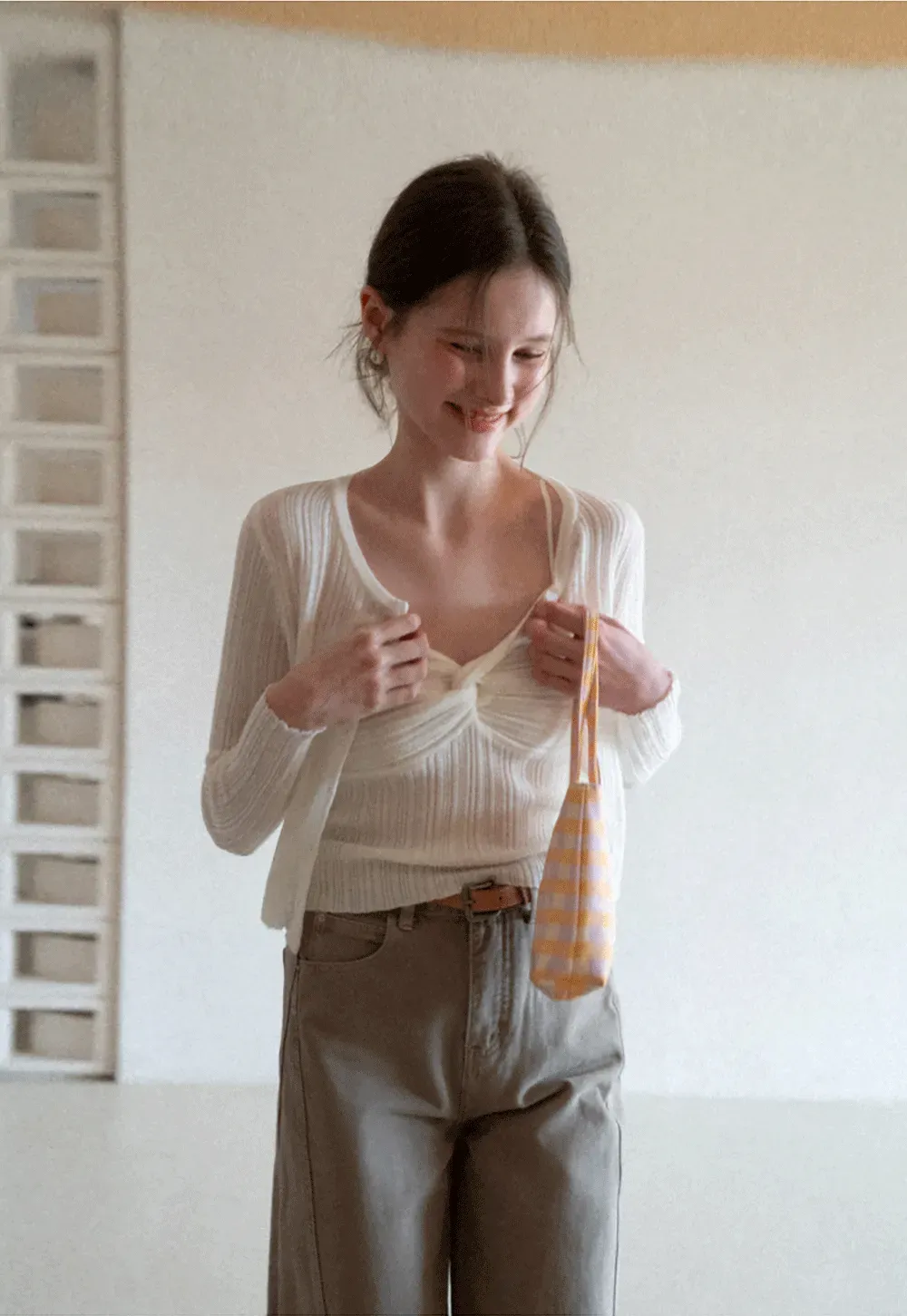 Ribbed knit sweater with V neckline and long sleeves