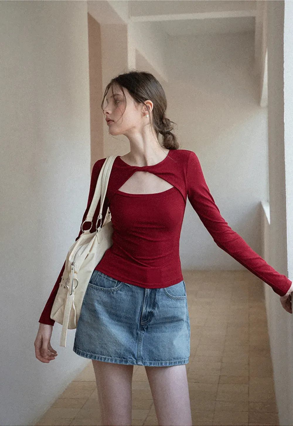 Long sleeve top with front cutout detail