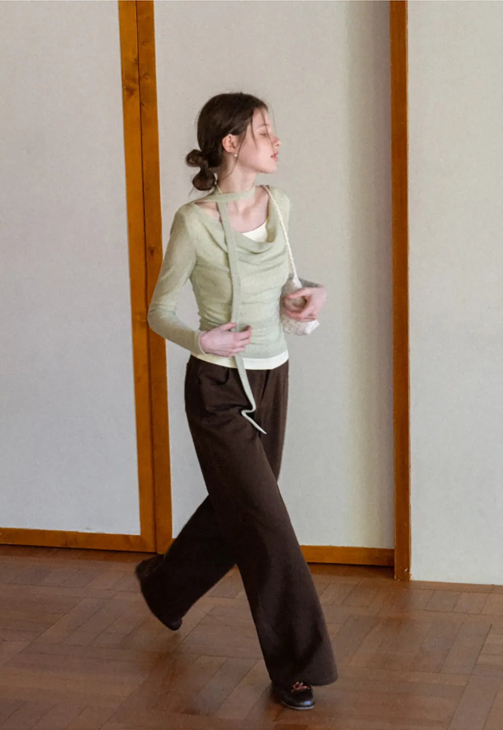 Long sleeve knit top with back tie detail