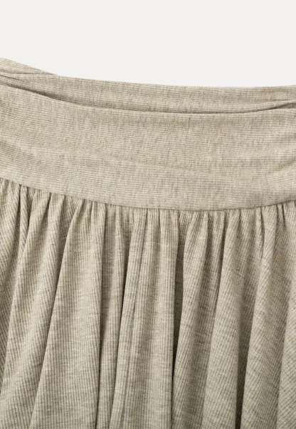 Long sleeve button front top and asymmetrical skirt