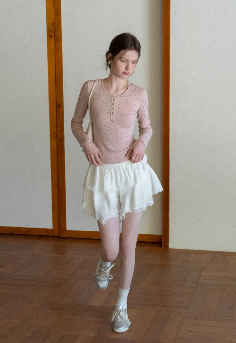 Long sleeve button front top with floral print