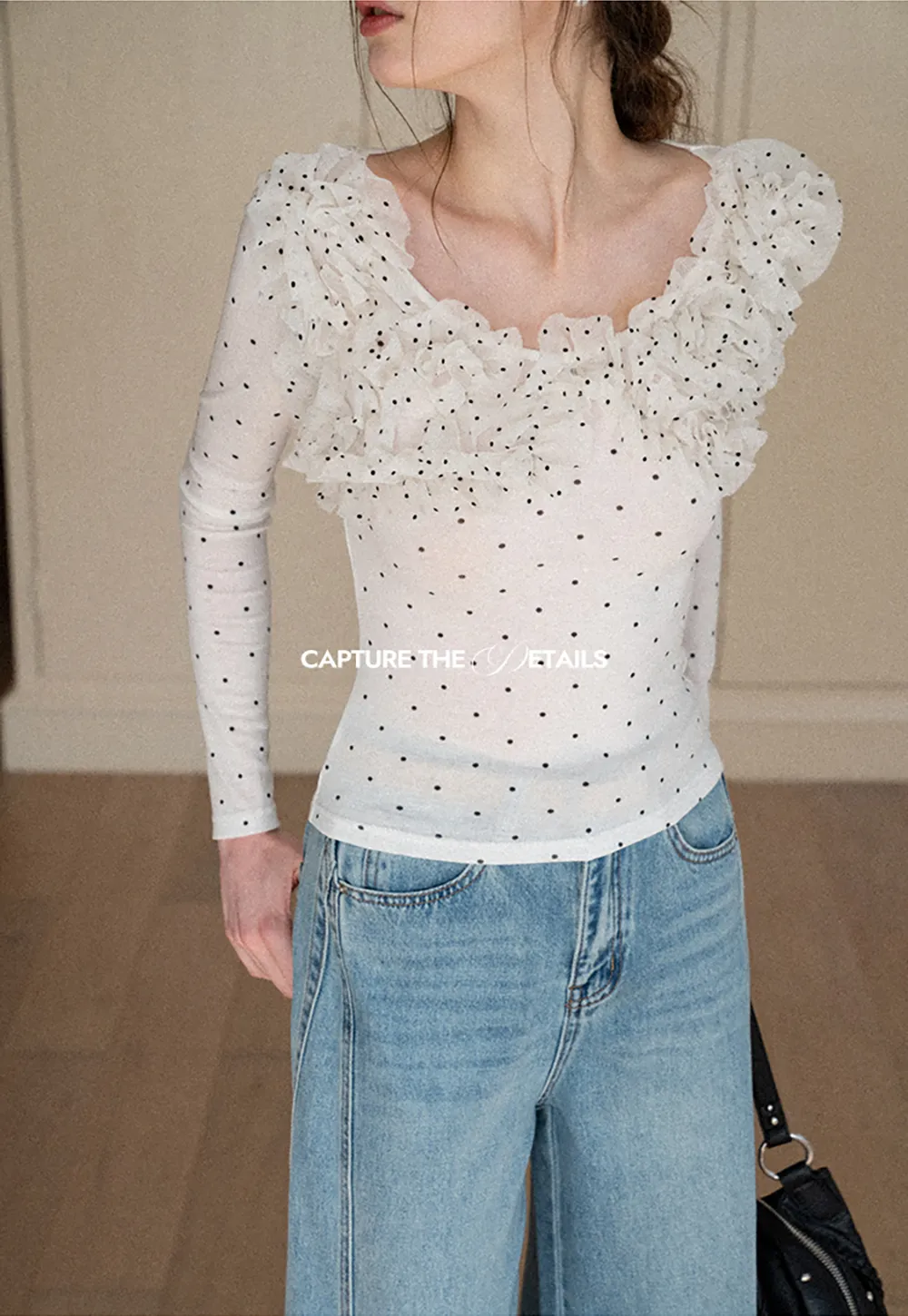 Polka dot long sleeve top with ruffled neckline