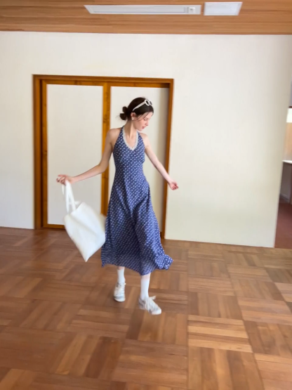 Halter neck dress with floral print and lace trim