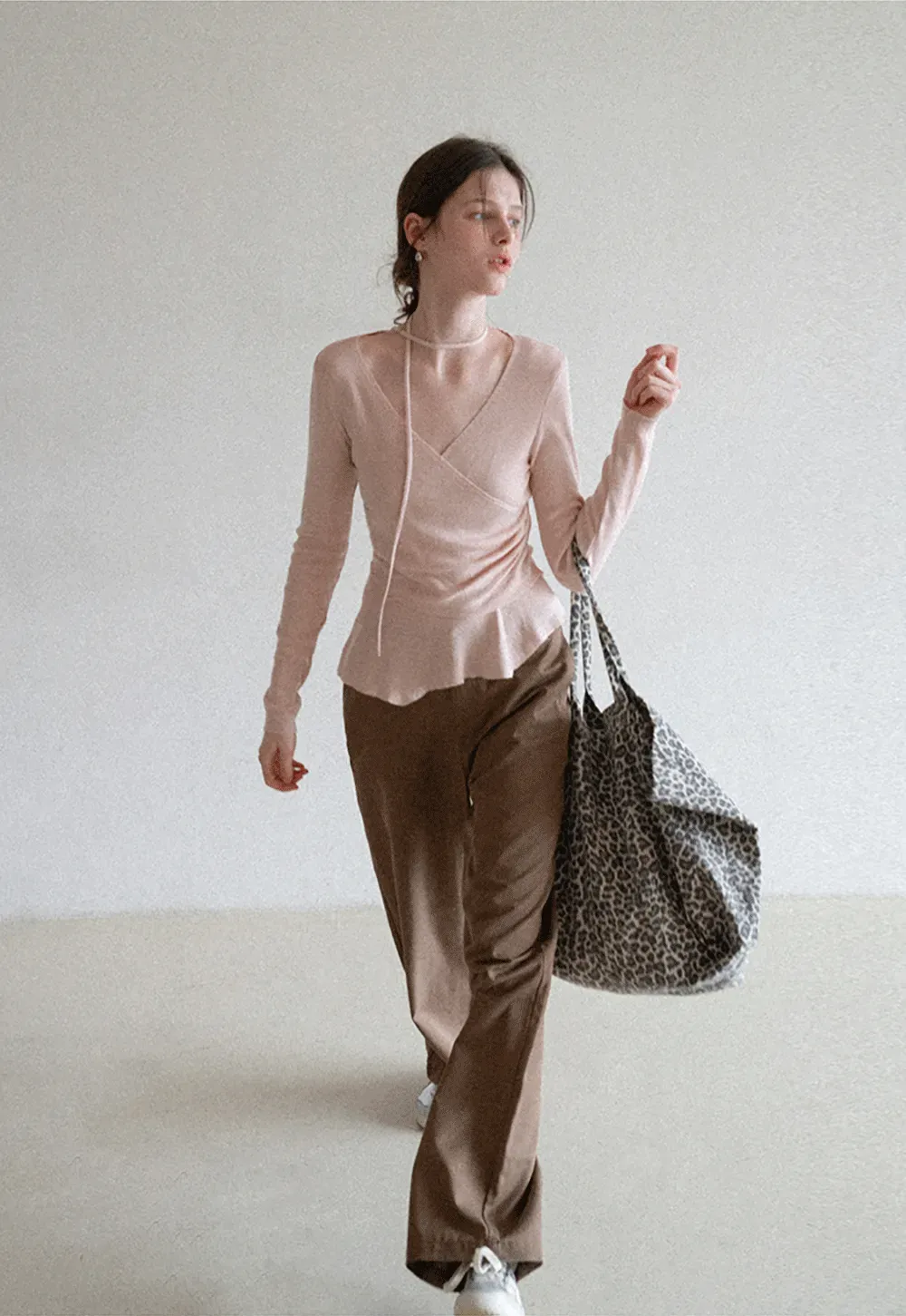 Long sleeve wrap knit sweater with ruched detail