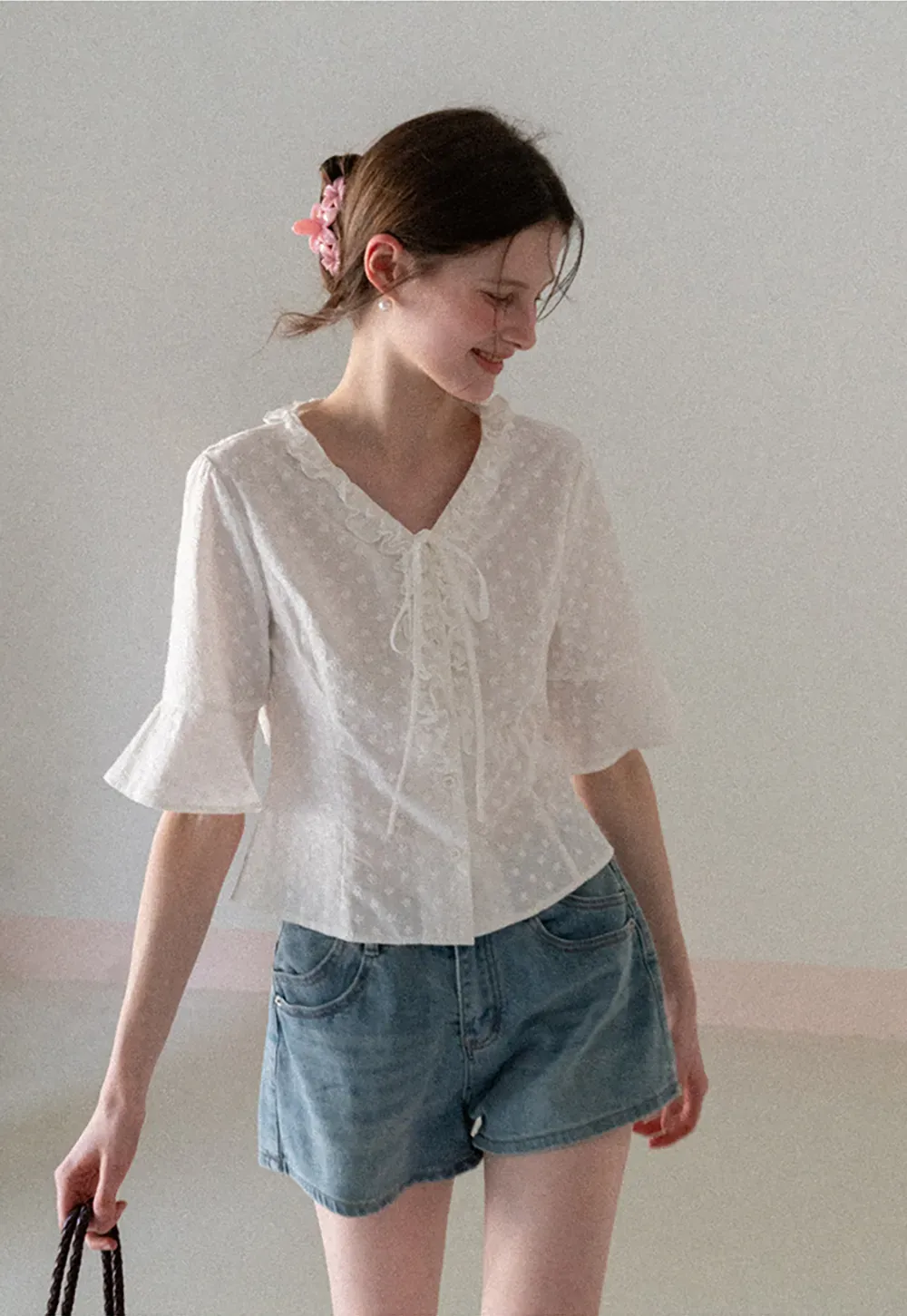 V neck blouse with lace trim and tie front