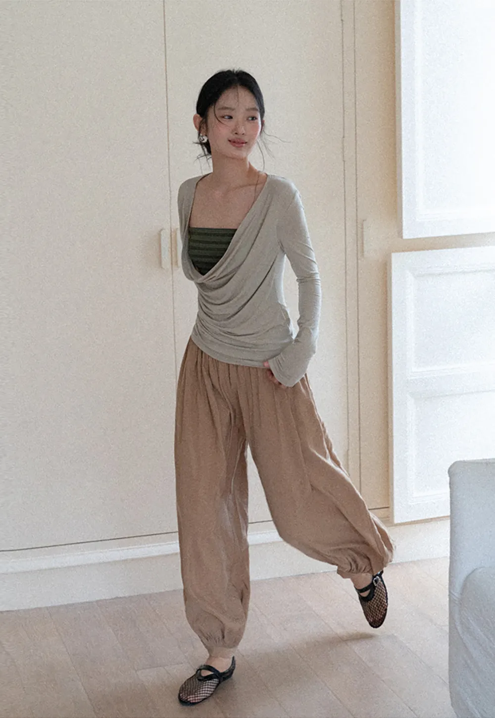 Long sleeve draped neckline top with square cutout