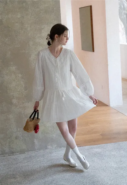 V neck long sleeve tiered dress with lace trim