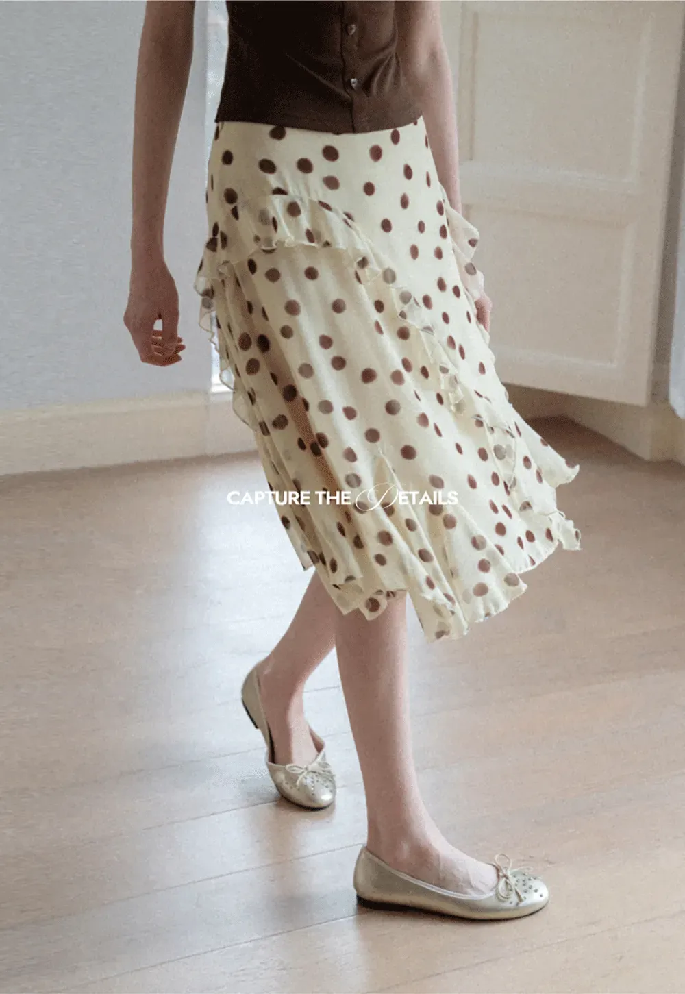 Polka dot ruffled asymmetrical midi skirt