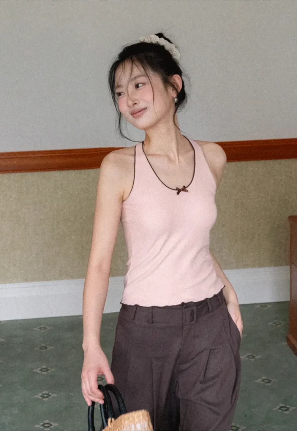 Halter neck tank top with thin straps and bow detail