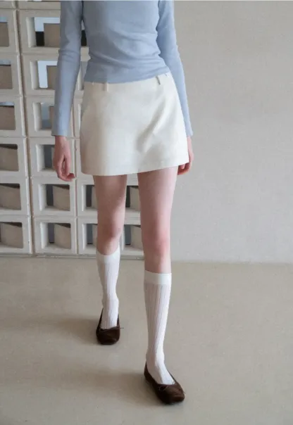 Elegant Pleated Mini Skirt with Asymmetrical Hem