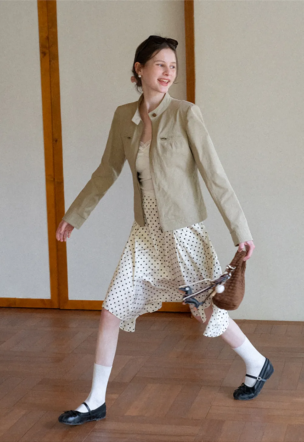 Short jacket with stand collar and front pockets