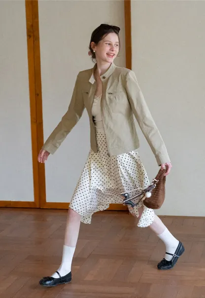 Short jacket with stand collar and front pockets